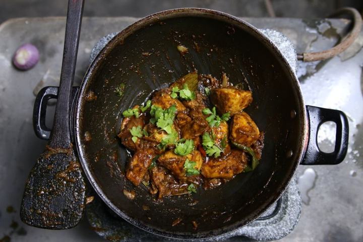 Mutton korma in a dark handi